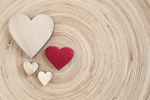 valentine's wooden hearts on a wooden background , valentine's day, day valentine postcard with space for text