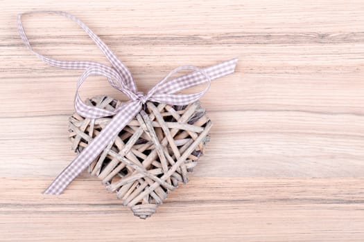 valentine's wooden heart on wooden background , valentine's day , day valentine postcard with space for text
