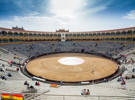 Madrid, Spain - May 11, 2012: Plaza de Toros de Las Ventas interior view with tourists gathering for the bull show in Madrid on a sunny day, Spain