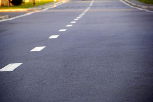 empty highway with a broken dividing strip