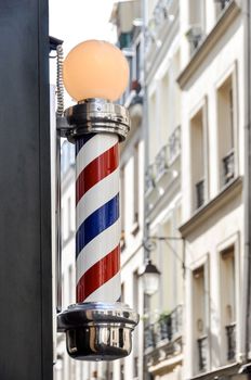 Barber shop sign in Paris, France