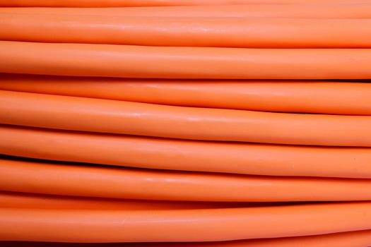 detail of multimode orange fiber optic cable background