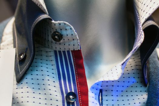 Close up of male shirts exposed in the clothes shop