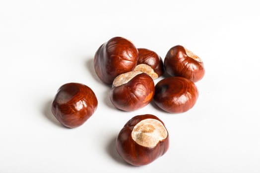 Set of delicious chestnuts on white bacground