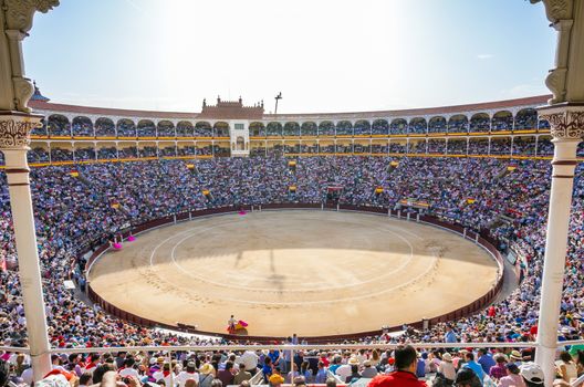 Madrid, Spain - May 11, 2012: Plaza de Toros de Las Ventas interior view with tourists gathering for the bull show in Madrid on a sunny day, Spain