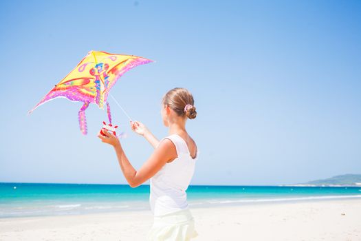 Beach cute girl kite flying outdoor coast ocean