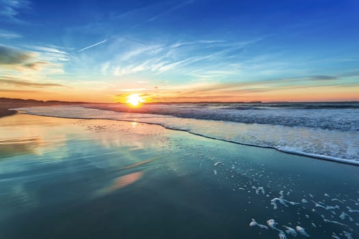 Beautiful orange sunset at the beach 