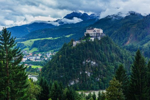 Castle Hohenwerfen by Salzburg on a misty mountain in the Alps