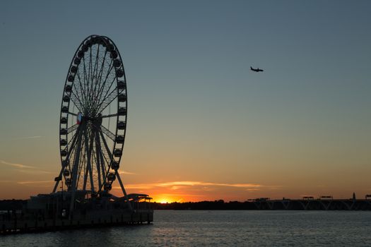 Beautiful summer sunset behind the Capital Wheel, National Harbor’s most iconic attraction