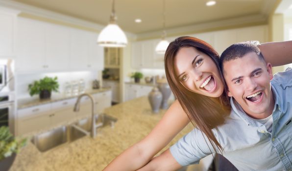 Playful Young Military Couple Inside Home with Beautiful Custom Kitchen.