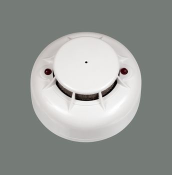 sensor fire alarm like a smiling emoticon. isolated on gray background