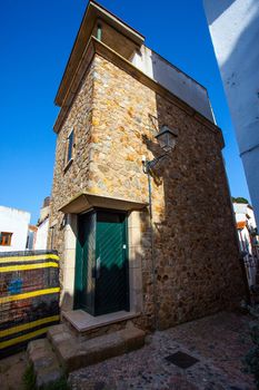 Tossa de Mar, Catalonia, Spain, 2013.06.17, sample Mediterranean architecture in the old town near the medieval fortress Vila Vella, editorial use only