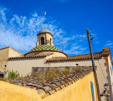 Tossa de Mar, Catalonia, Spain, 06.19.2013, landscape ancient town with a dome Catholic Church, editorial use only