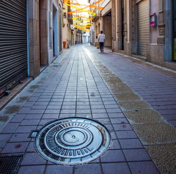 Tossa de Mar, Catalonia, Spain JUNE 23, 2013: early morning on the streets in historical part of a little Mediterranean town