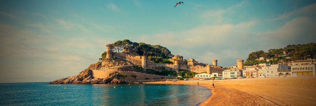 Tossa de Mar, Catalonia, Spain, JUNY 13, 2013, the panorama overlooking the bay Badia de Tossa and medieval fortress Vila Vella on a rock. Editorial use only. Instagram style image