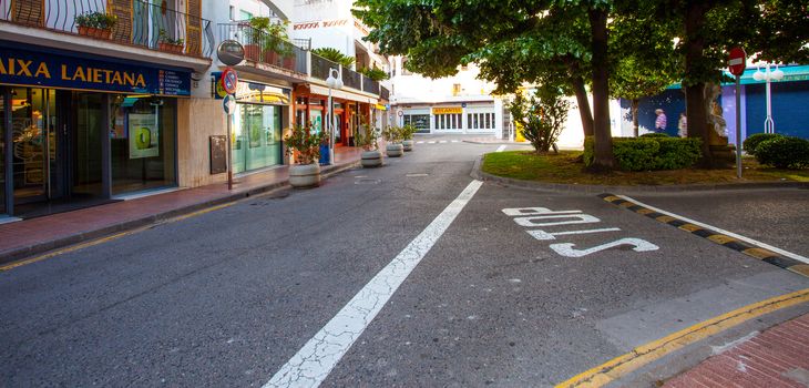 Tossa de Mar, Catalonia, Spain, June 23, 2013: crossroad in the little town at summer early morning