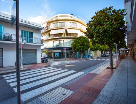 Tossa de Mar, Catalonia, Spain, JUNE 23, 2013: early morning on a Avinguda Costa Brava street 