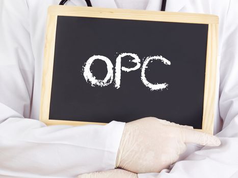 Doctor shows information on blackboard: OPC