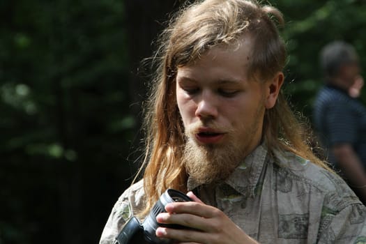 Khimki, Moscow region, Russia - July 21, 2012. The Khimki forest defender Simon Kolobaev. The gathering of the Khimki forest defenders and residents in the grove near the source of St. George. The meeting devoted to the threat of cutting down oak