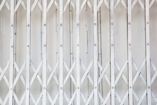 White iron gate. A piece of white iron gate of the house.
