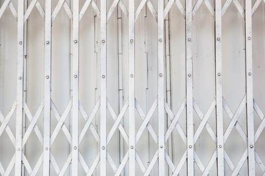 White iron gate. A piece of white iron gate of the house.