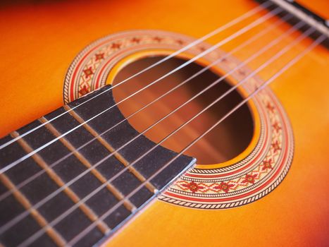 Detail of an acoustic guitar for playing music