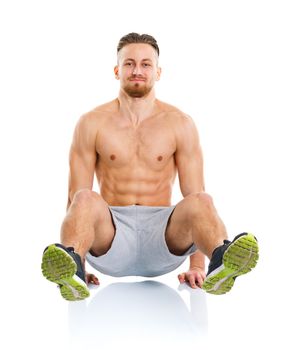 Sport attractive man doing fitness exercises on the white background