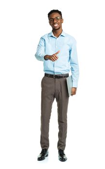 Happy african american college student standing with laptop and finger up on white background