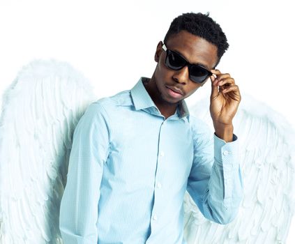 African American young man with angel wings in sunglasses