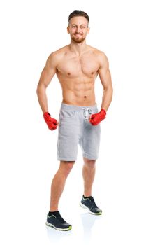 Athletic attractive man wearing boxing bandages on the white background