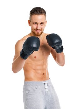 Sport attractive man wearing boxing gloves on the white background