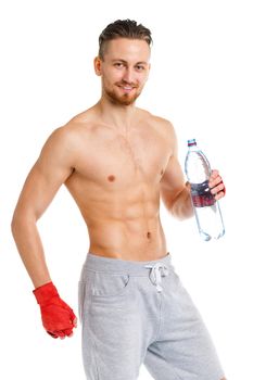 Sport attractive man wearing boxing bandages with bottle of water on the white background
