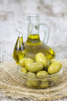 Olive oil and green olives