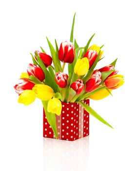 beautiful tulips in the red polka-dot gift box. happy mothers day, romantic still life, fresh flowers