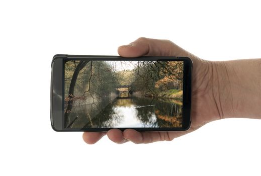 male hand with mobile phone isolated on white