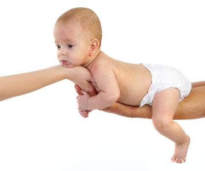 baby newborn on parents hands. new born kid and family concept.