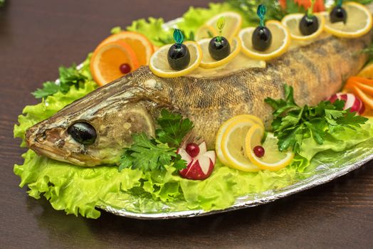 zander fish baked with greens fruits and vegetables