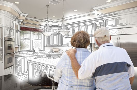 Senior Couple Looking Over Custom Kitchen Design Drawing and Photo Combination.