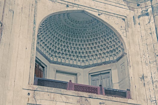 Decorative design of Entrance in Bibi-ka-Maqbara, Aurangabad , Maharashtra, India. The Bibi Ka Maqbara, Tomb of the Lady is a maqbara located in Aurangabad, Maharashtra, India. It was commissioned by the sixth Mughal Emperor Aurangzeb in the late 17th century in the memory of his first wife, Dilras Banu Begum or Rabia-ud-Daurani. It bears a striking resemblance to the famous Taj Mahal.