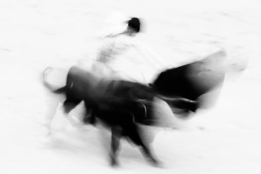 Bullfigting in bullring Las Ventas, Madrid, Spain. Artistic abstract black and white image.