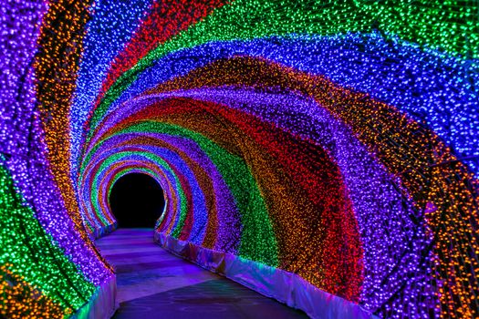 Colorful rainbow tunnel light, abstract background in night