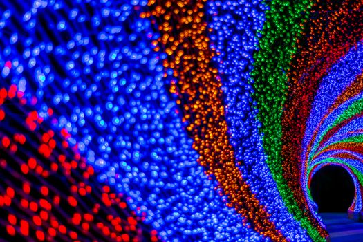 Colorful rainbow tunnel light, abstract background in night