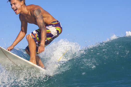 Surfer on Amazing Blue Wave, Bali island.