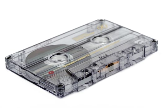 close up of vintage audio tape cassette isolated on white