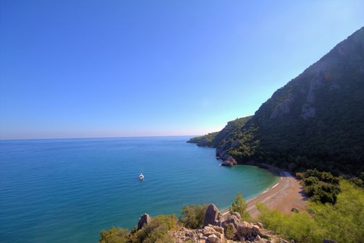 sea a beach and mountains from height