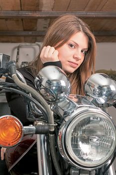 girl posing on motorcycle