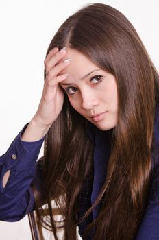 Portrait of a beautiful young woman of the European type on a white background