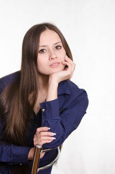 Portrait of a beautiful young woman of the European type on a white background