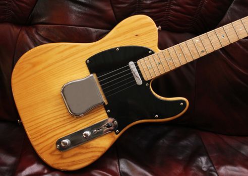 An early solid body electric guitar with chrome hardware