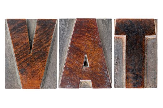 VAT (value added tax) - text in isolated letterpress wood type printing blocks